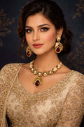 Royal ruby heritage necklace set - Pakistani women's luxury bridal jewelry with ruby stones and gold tone finish front view
