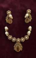 Antique pearl stone necklace set - Pakistani women's luxury bridal jewelry with sculpted pearl detailing and gold tone finish front view