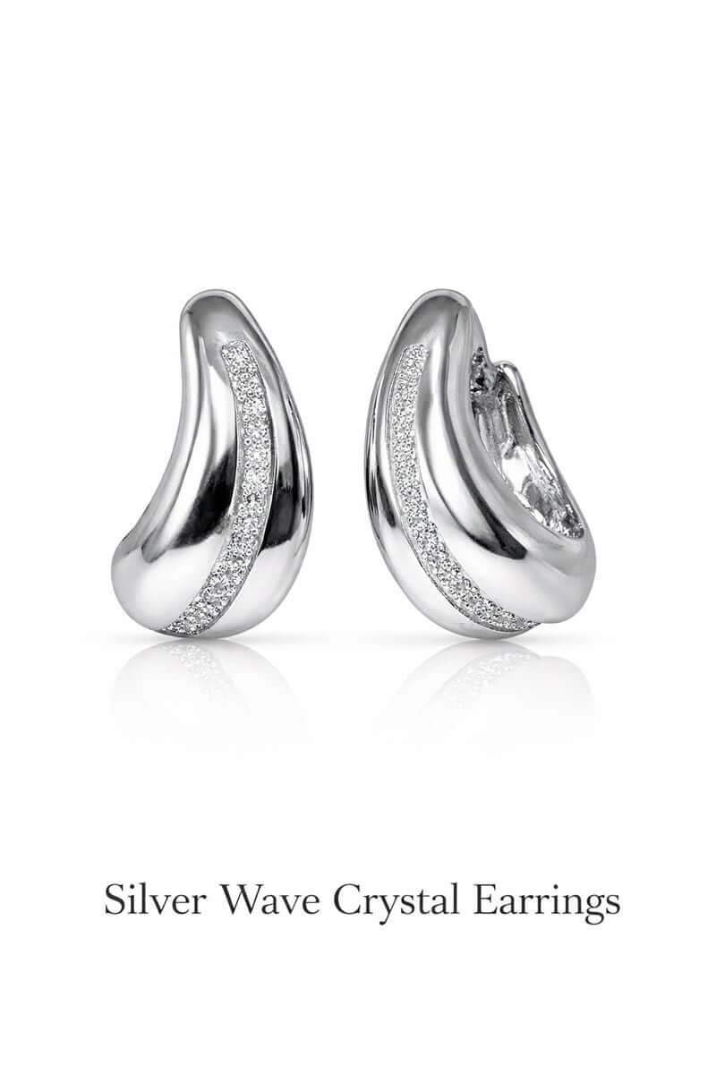 Pakistani women's golden wave sculpted earrings side view