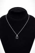 Black stone silver pendant necklace rectangular - Pakistani women's modern jewelry with rectangular black stone and silver tone frame front view