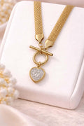 Golden heart mesh chain necklace - Pakistani women's casual jewelry with heart charm and gold tone mesh chain front view