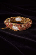 Ruby crystal baroque pearl antique gold bracelet - Pakistani women's luxury bridal jewelry with filigree detailing and ruby red crystals front view