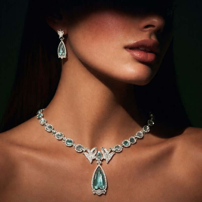 Pakistani women's emerald bird motif necklace set detail view